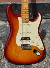 2015 Fender Stratocaster American Deluxe HSS in a factory Sienna Sunburst finish